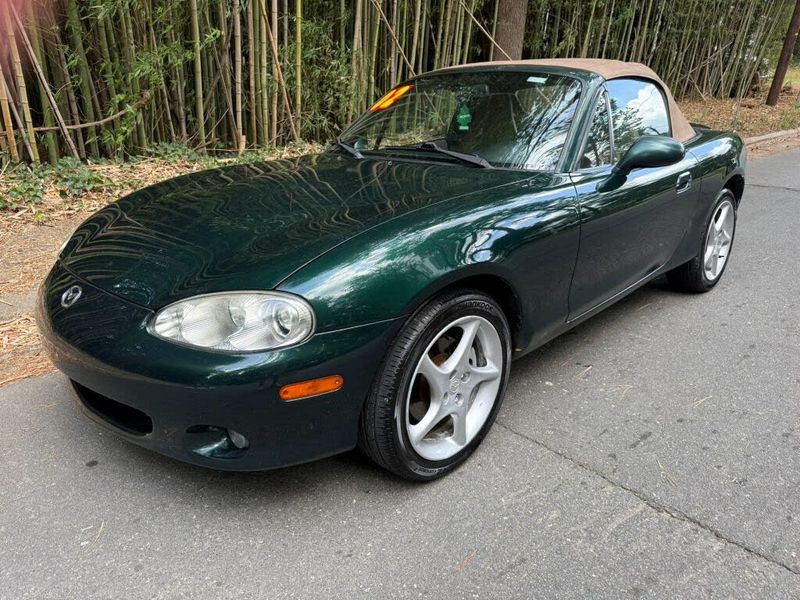 2002 Mazda MX-5 — a typically priced live listing