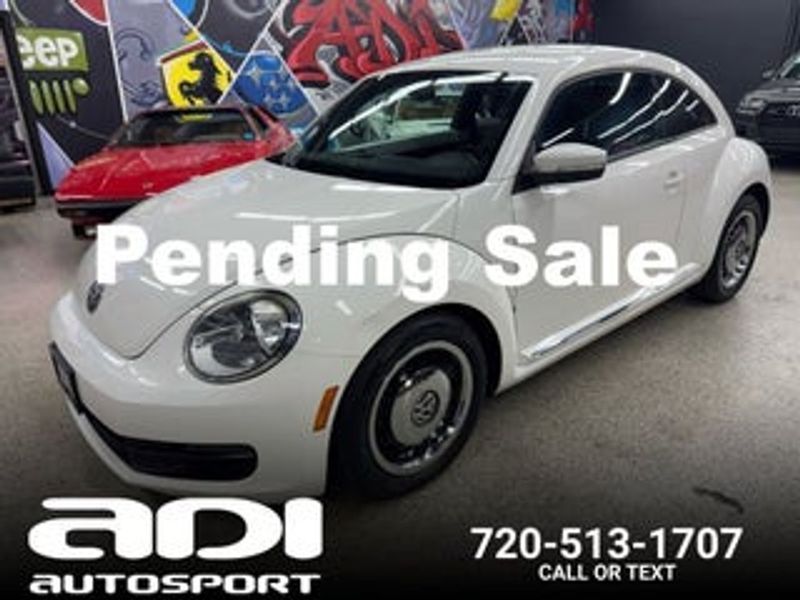 2012 Volkswagen Beetle — a typically priced live listing