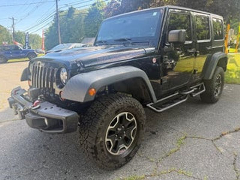 2014 Jeep Wrangler — a typically priced live listing
