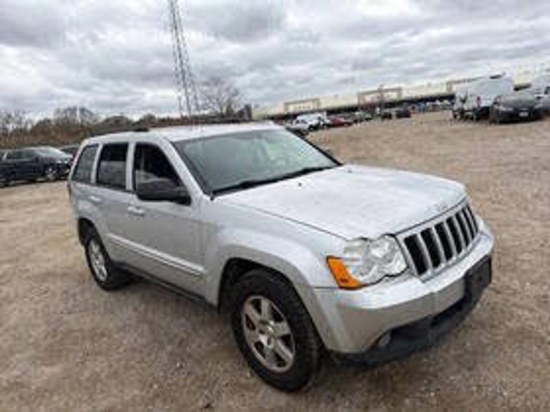 2010 Jeep Grand Cherokee — a typically priced live listing