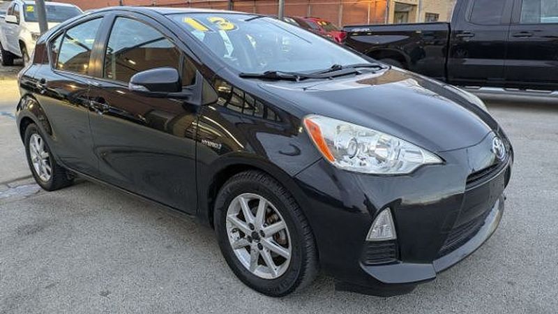 2013 Toyota Prius C — a typically priced live listing
