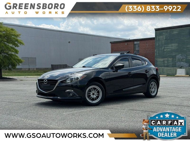 2015 Mazda 3 — a typically priced live listing