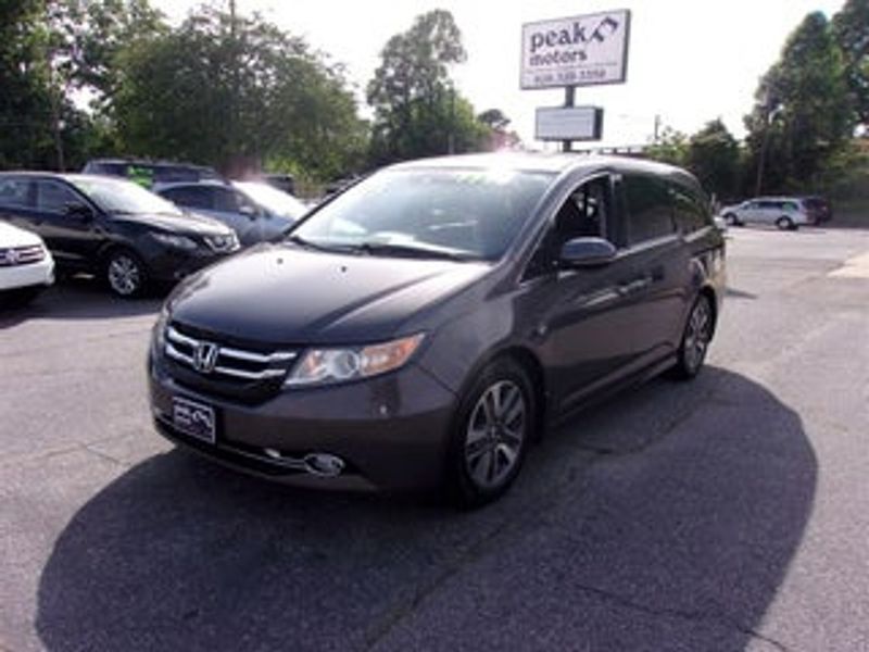 2013 Nissan Quest — a typically priced live listing