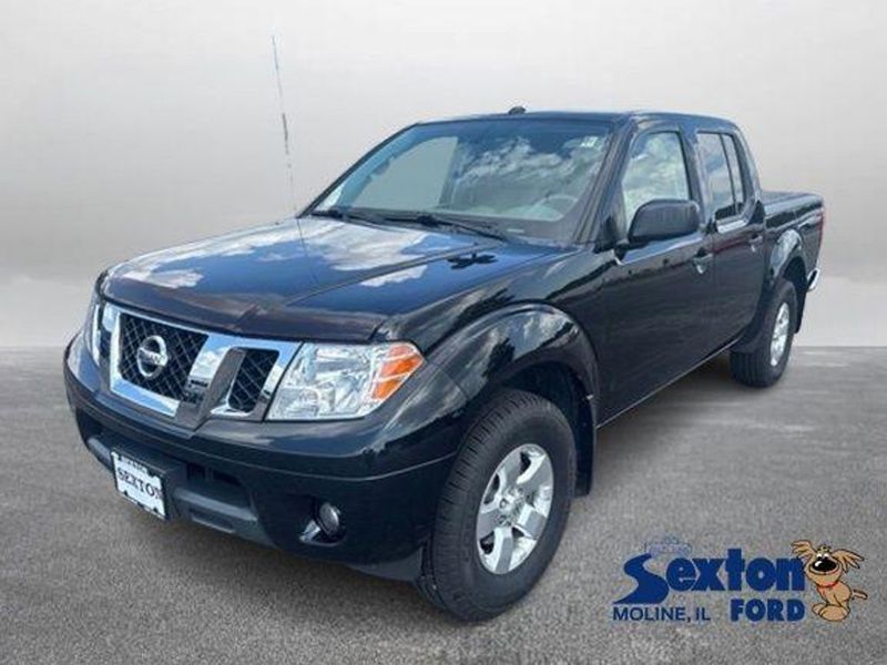 2013 Nissan Frontier — a typically priced live listing