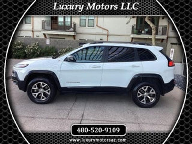 2014 Jeep Cherokee — a typically priced live listing