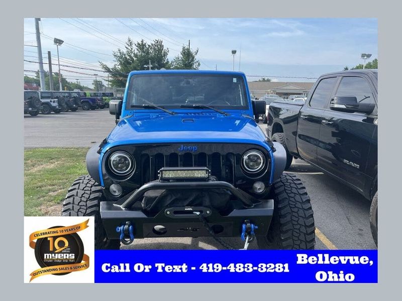2015 Jeep Wrangler — a typically priced live listing