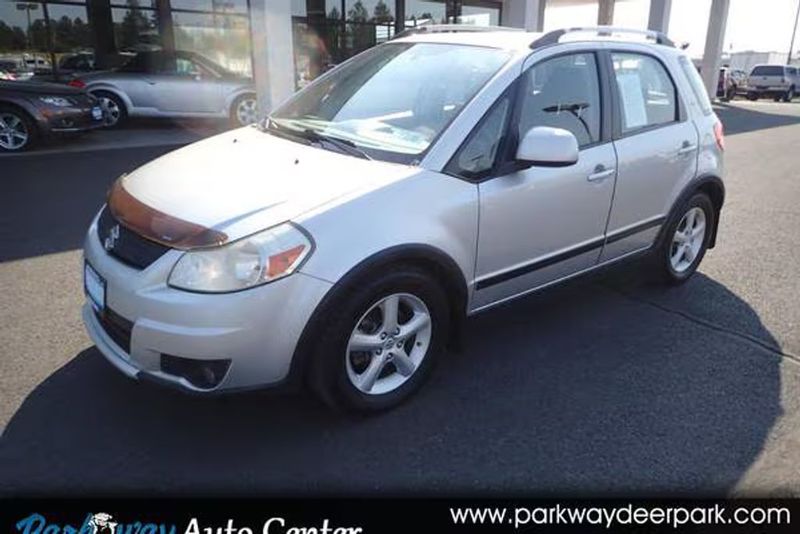 2008 Suzuki SX4 — a typically priced live listing