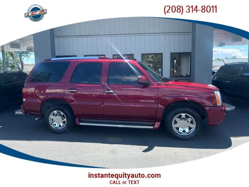 2005 Cadillac Escalade — a typically priced live listing