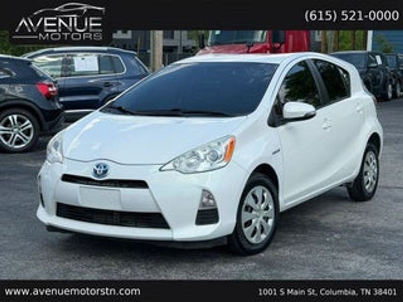 2015 Toyota Prius C — a typically priced live listing