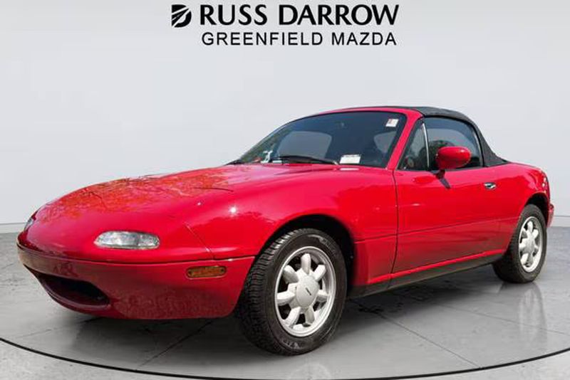 1990 Mazda MX-5 — a typically priced live listing