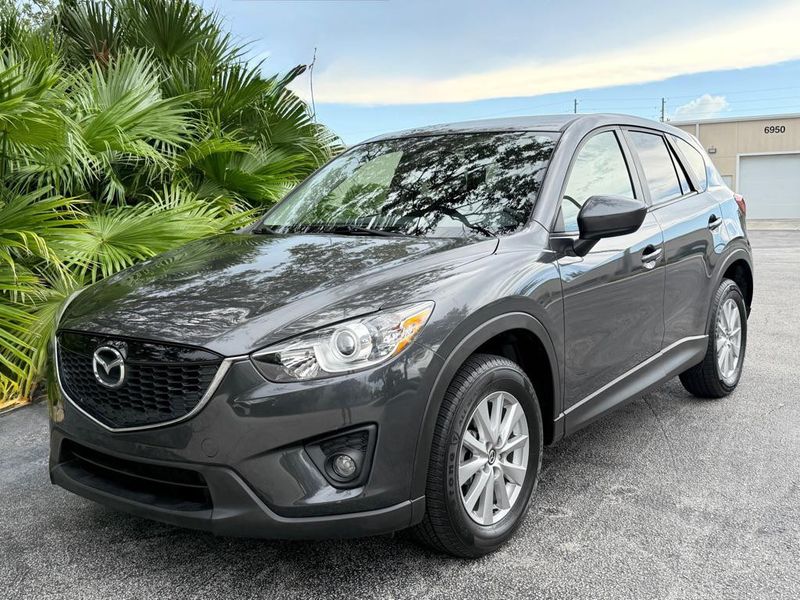 2014 Mazda CX-5 — a typically priced live listing