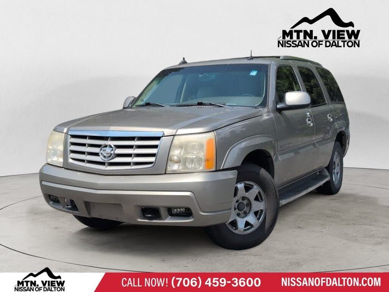 2003 Cadillac Escalade — a typically priced live listing