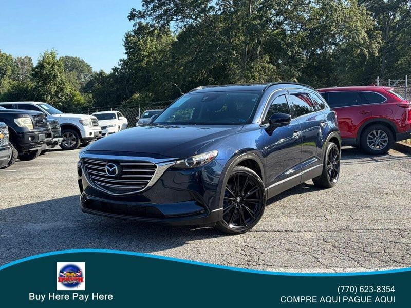 2017 Mazda CX-9 — a typically priced live listing