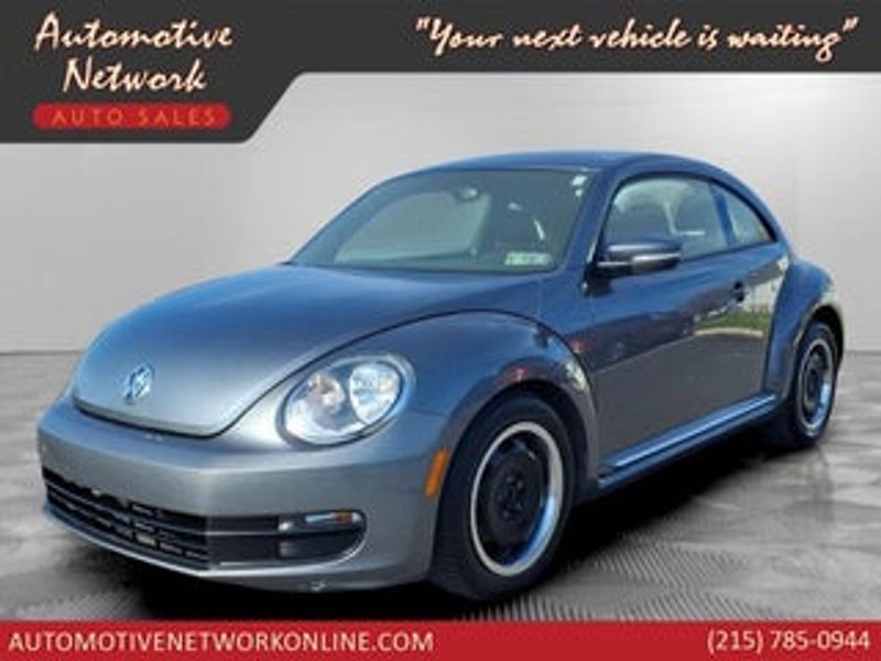 2014 Volkswagen Beetle — a typically priced live listing