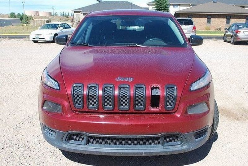 2014 Jeep Cherokee — a typically priced live listing