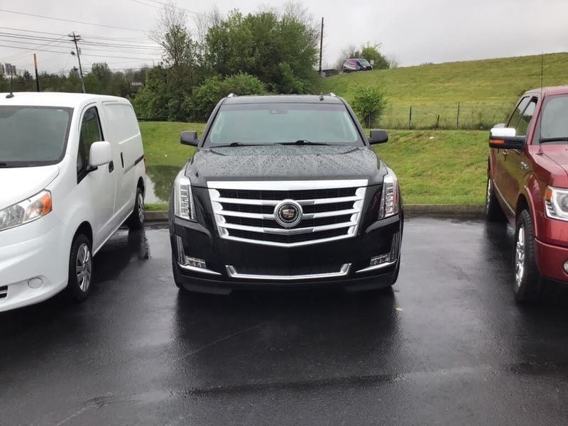 2015 Cadillac Escalade — a typically priced live listing