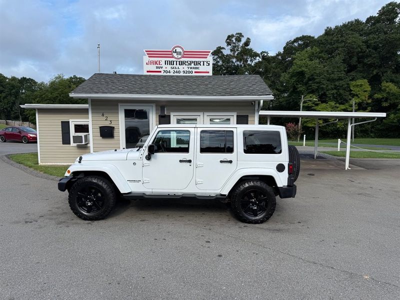 2014 Jeep Wrangler — a typically priced live listing