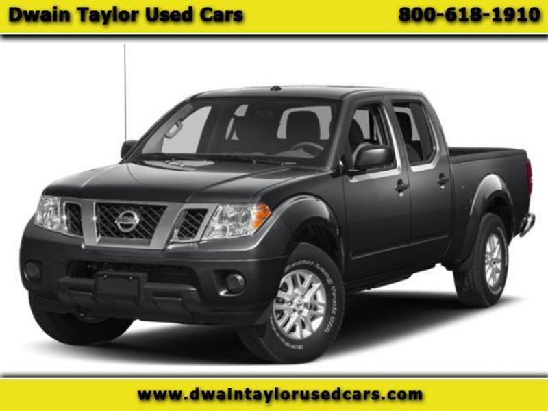 2015 Nissan Frontier — a typically priced live listing