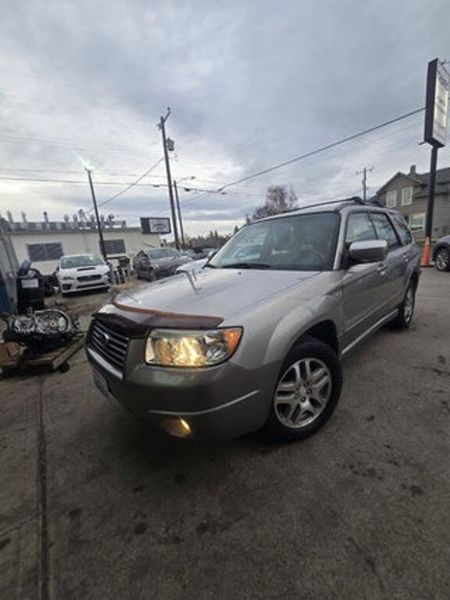 2004 Mazda Tribute — a typically priced live listing