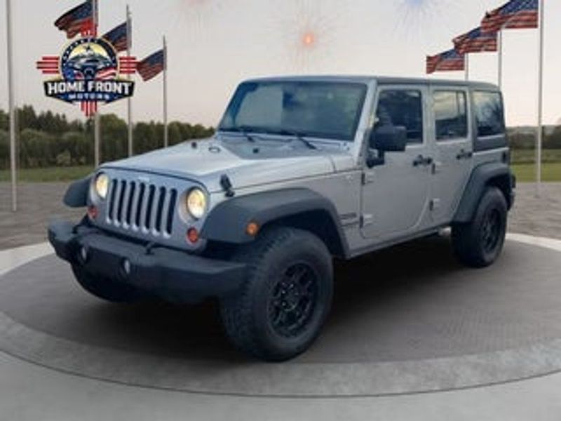 2013 Jeep Wrangler — a typically priced live listing