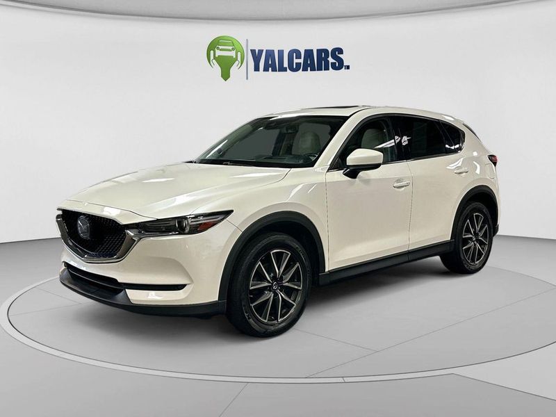 2018 Mazda CX-5 — a typically priced live listing