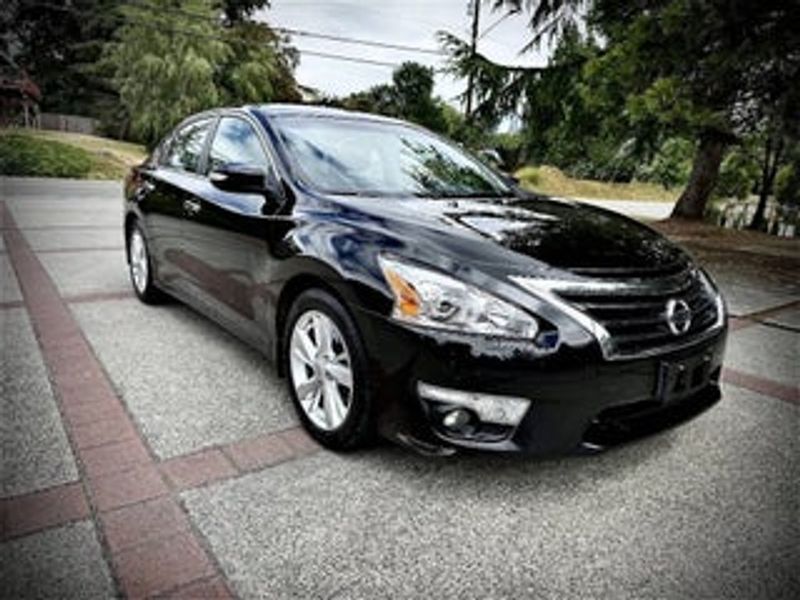2013 Nissan Altima — a typically priced live listing