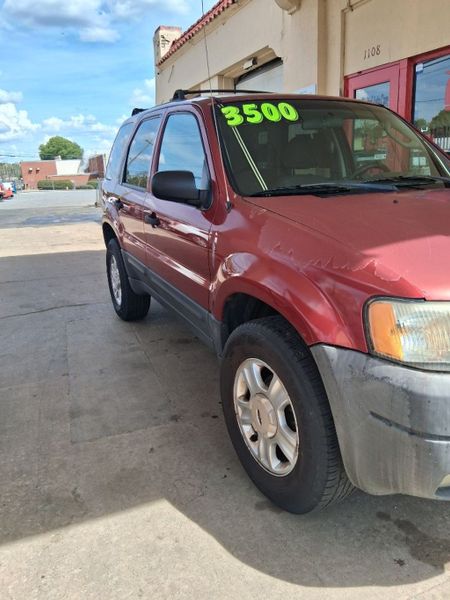 2003 Ford Escape — a typically priced live listing