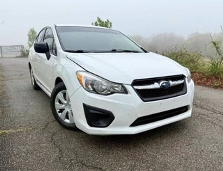 2012 Subaru Impreza — a typically priced live listing