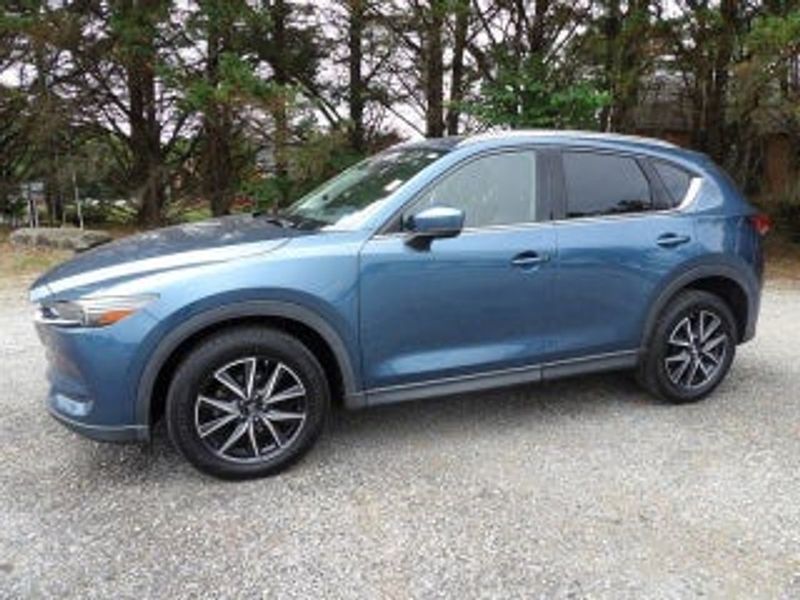 2016 Mazda CX-5 — a typically priced live listing