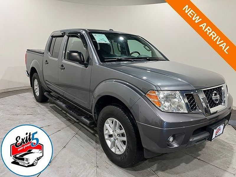 2016 Nissan Frontier — a typically priced live listing
