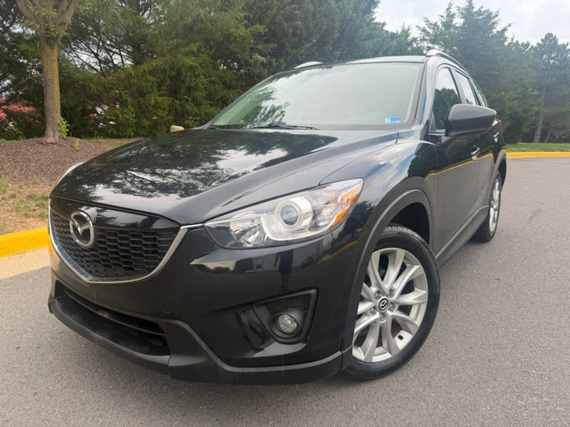 2015 Mazda CX-5 — a typically priced live listing