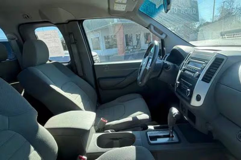 2014 Nissan Frontier — a typically priced live listing