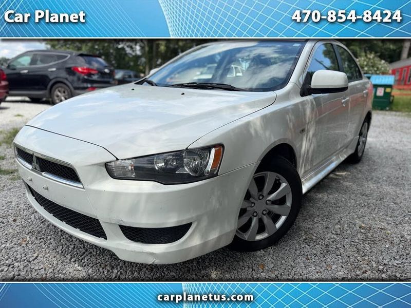 2014 Mitsubishi Lancer — a typically priced live listing