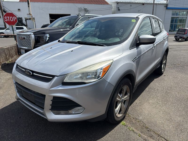 2014 Ford Escape — a typically priced live listing