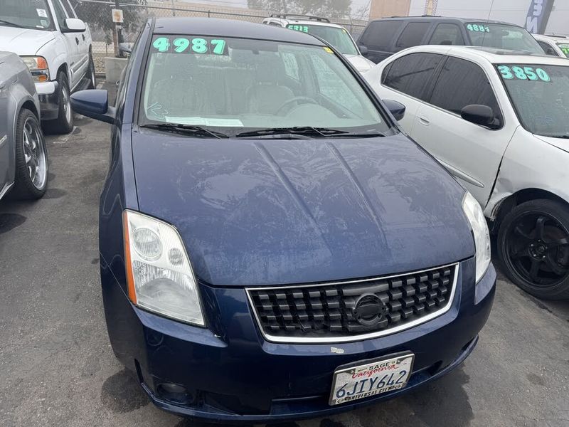 2009 Nissan Sentra — a typically priced live listing