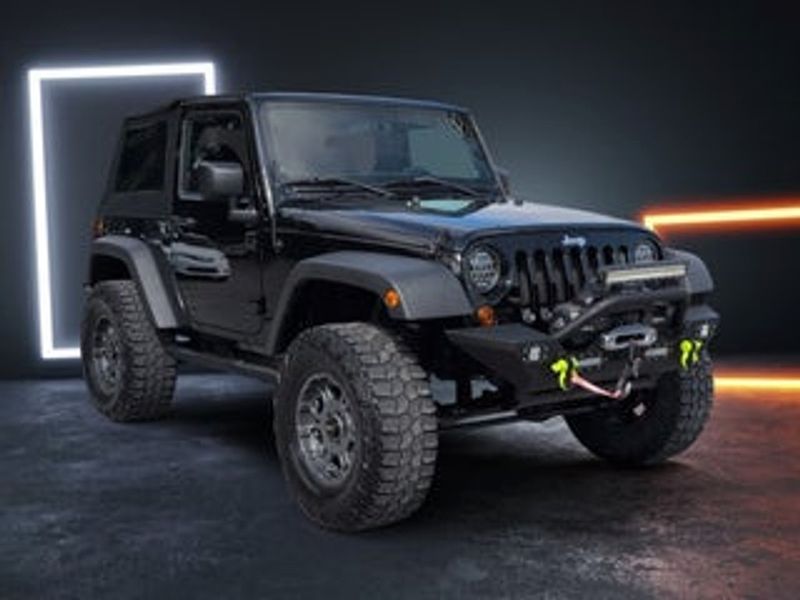 2012 Jeep Wrangler — a typically priced live listing