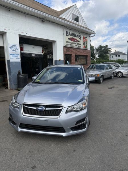 2015 Subaru Impreza — a typically priced live listing