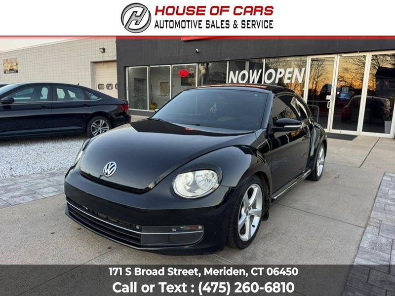 2015 Volkswagen Beetle — a typically priced live listing