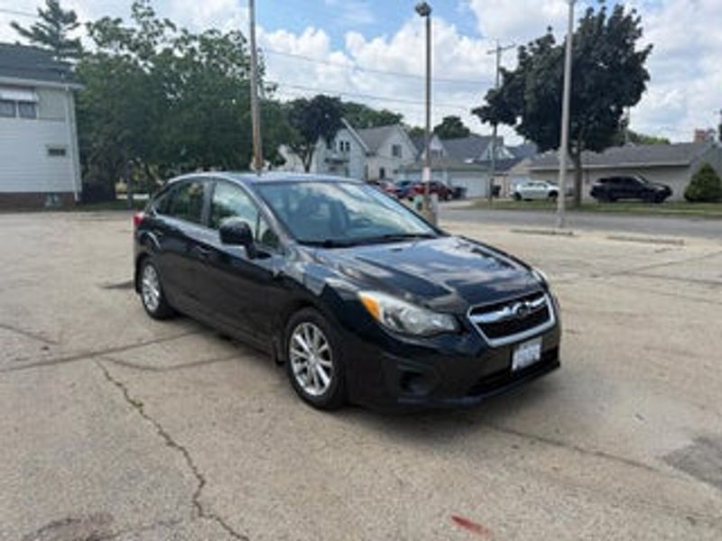 2014 Subaru Impreza — a typically priced live listing