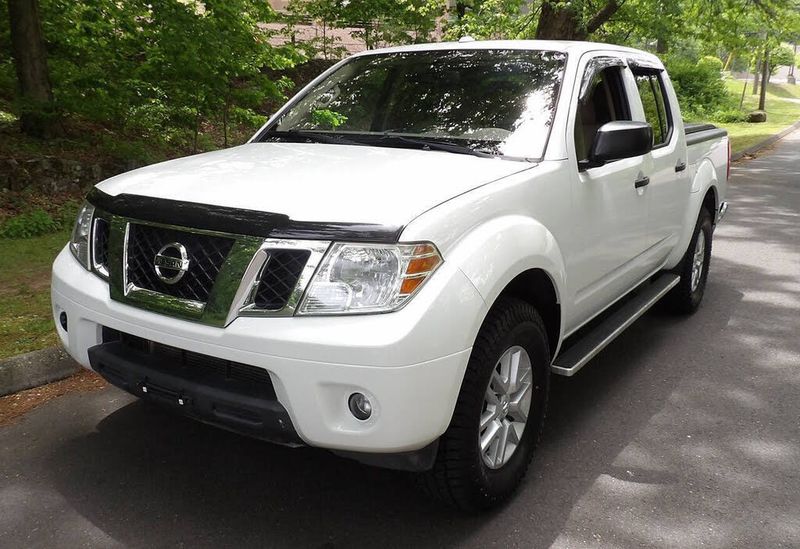 2017 Nissan Frontier — a typically priced live listing