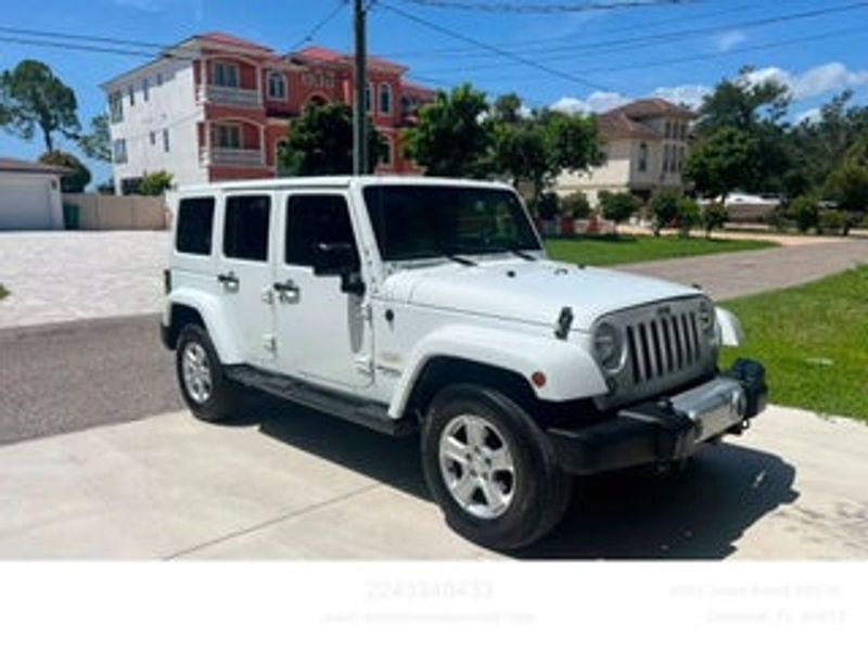 2015 Jeep Wrangler Unlimited — a typically priced live listing