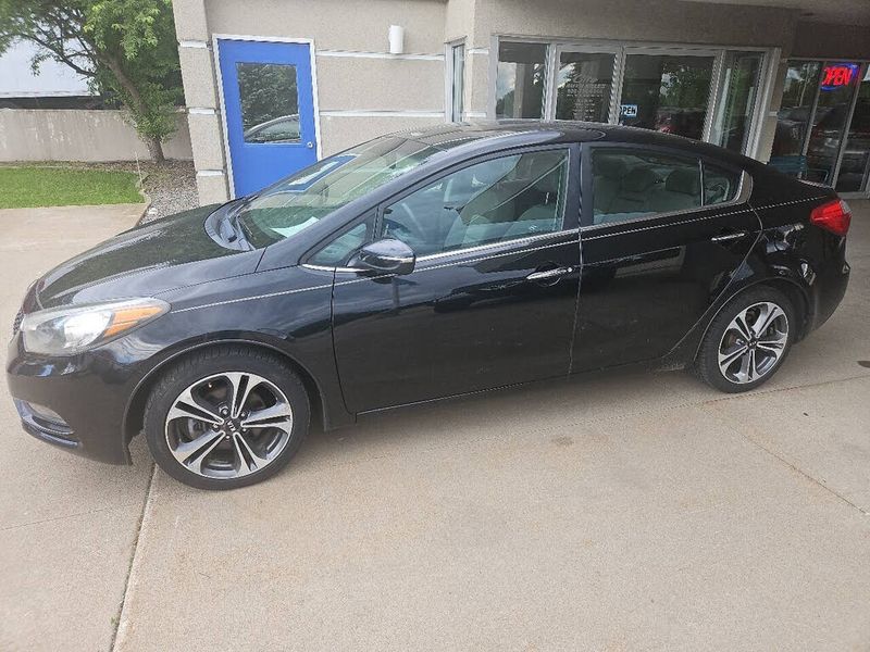 2014 Kia Forte — a typically priced live listing
