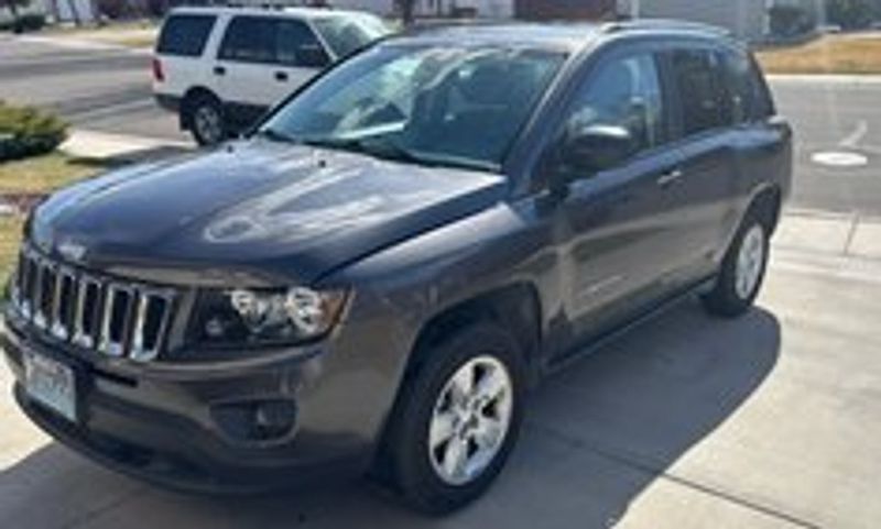 2014 Jeep Compass — a typically priced live listing