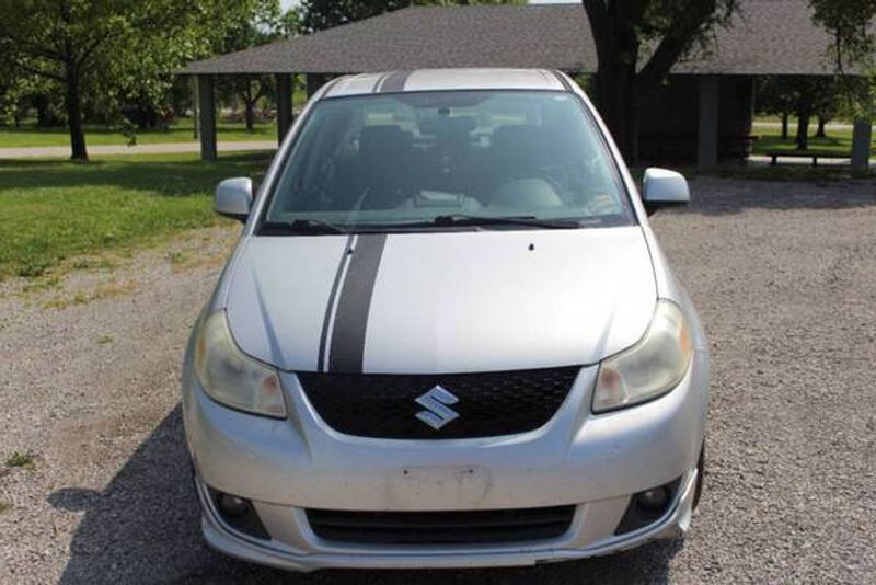 2009 Suzuki SX4 — a typically priced live listing