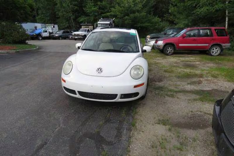 2010 Volkswagen Beetle — a typically priced live listing