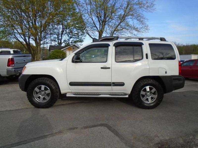2013 Nissan Xterra — a typically priced live listing