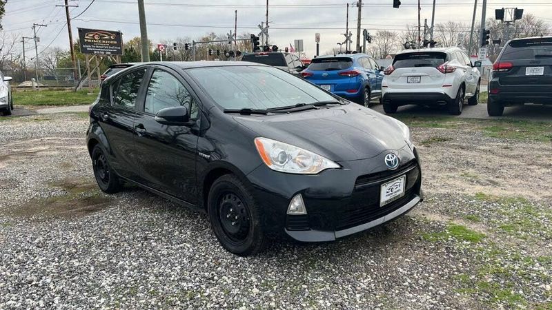 2014 Toyota Prius C — a typically priced live listing