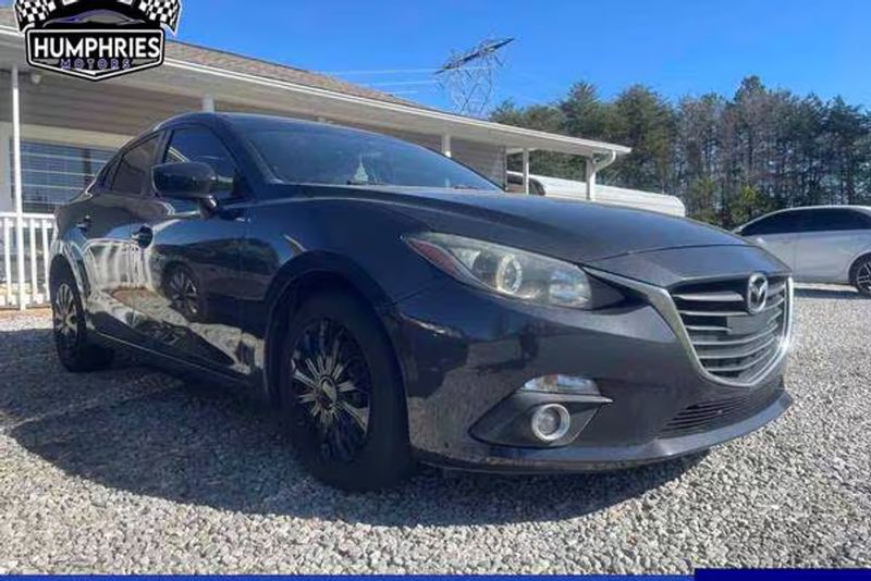 2014 Mazda 3 — a typically priced live listing