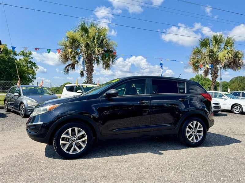 2015 Kia Sportage — a typically priced live listing