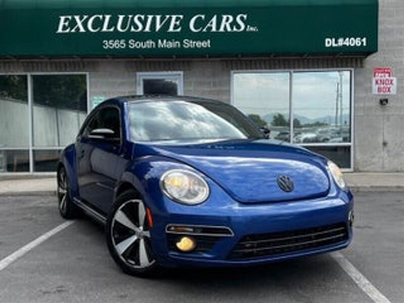2014 Volkswagen Beetle — a typically priced live listing